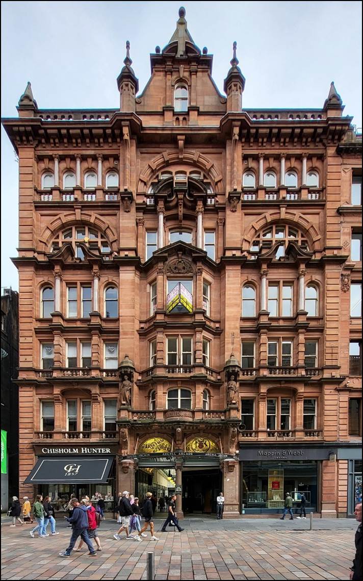 A large building with many windows
Description automatically generated