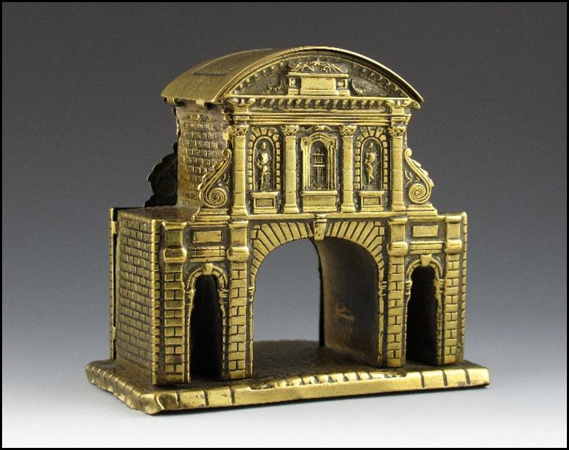 A gold metal object with a arched entrance

Description automatically generated with medium confidence