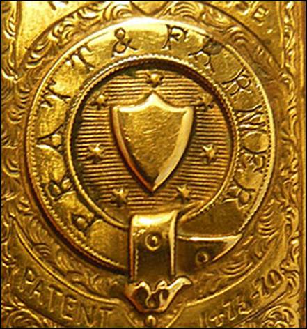 A close-up of a gold object
Description automatically generated