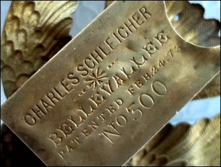 A close-up of a plaque

Description automatically generated