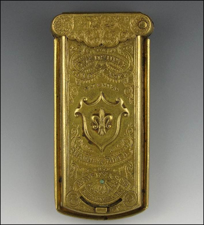 A close-up of a gold cigarette case

Description automatically generated